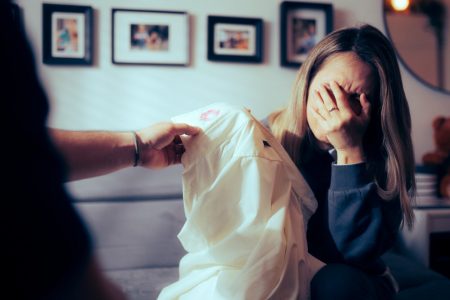 woman has been caught with a lipstick on her shirt