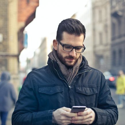 man holding a phone in his hands